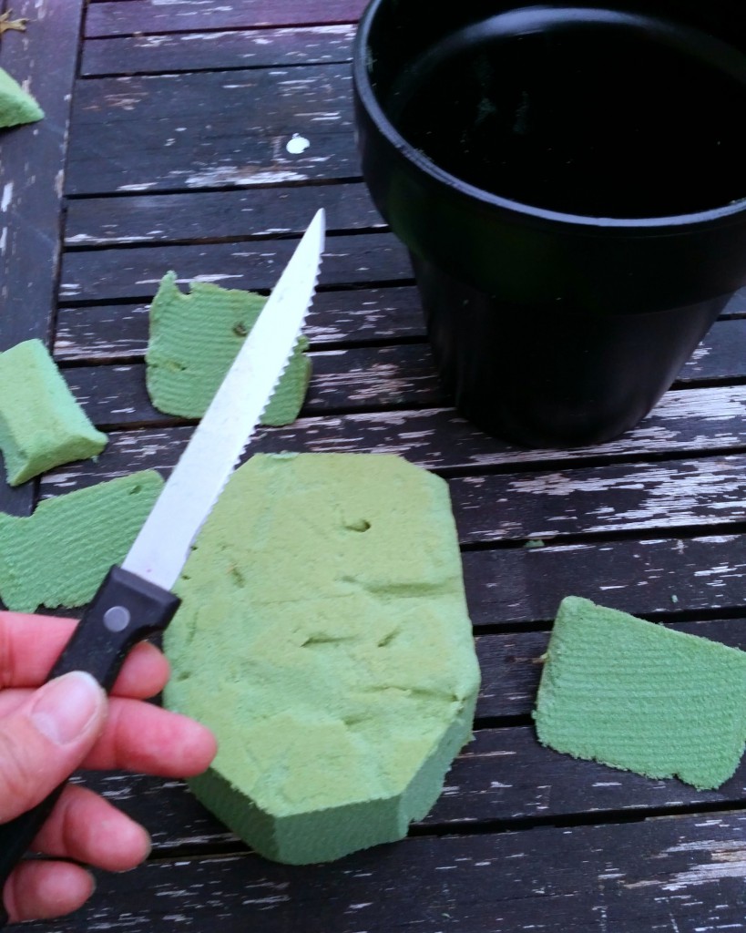 trimming green styrofoam