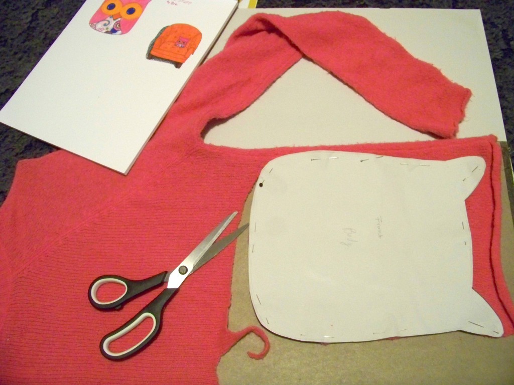 cutting out the pattern for an owl stuffy