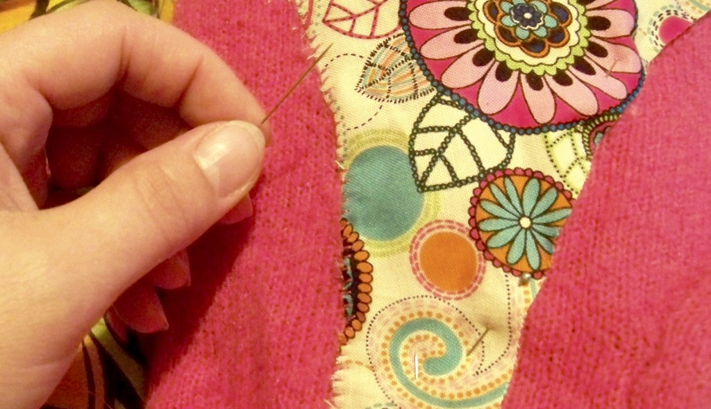 sewing the stomach onto a cute stuffed owl