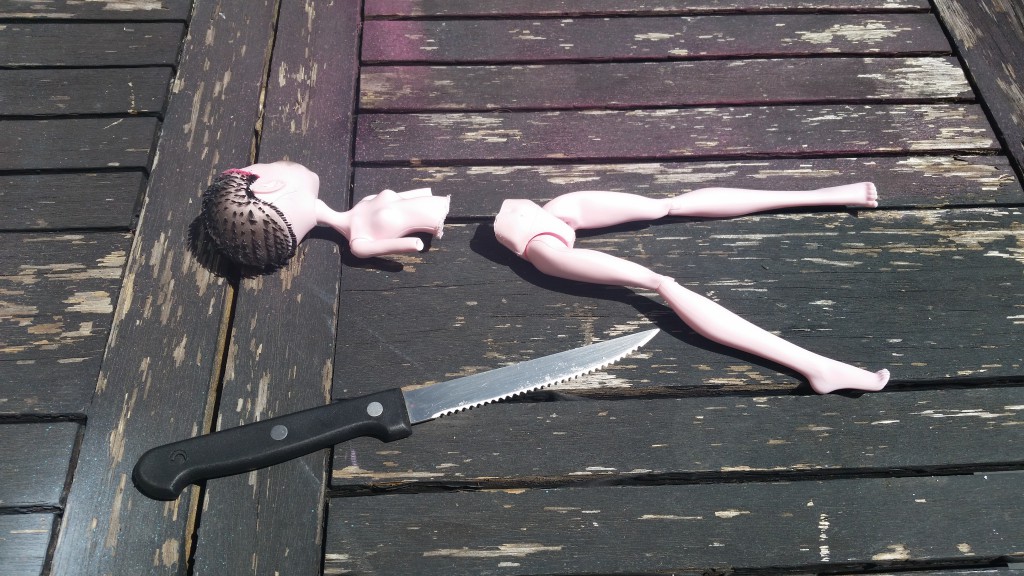 sawing a doll in half